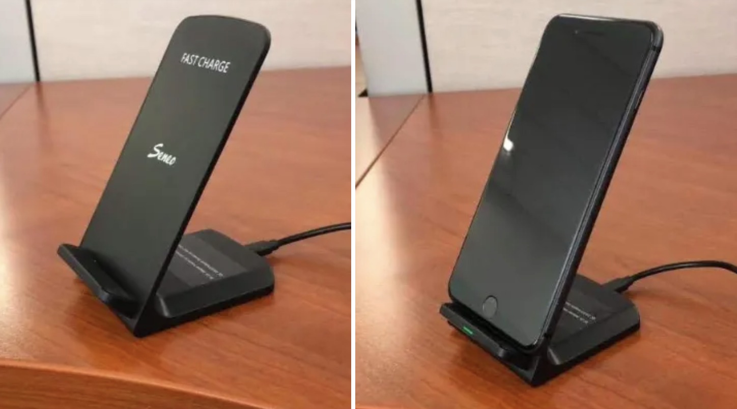 Reviewer pic of the charger stand by itself and then with an iPhone set in it, charging