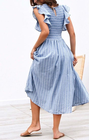 A model showing the back of the dress