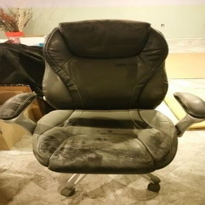 Reviewer's worn down office chair
