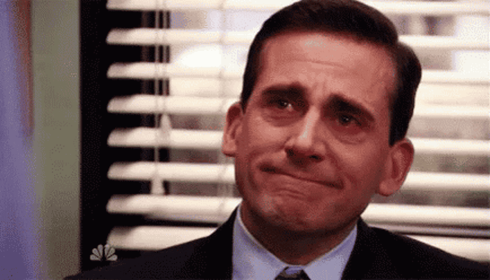 Gif of Michael Scott from The Office looking emotional and happy