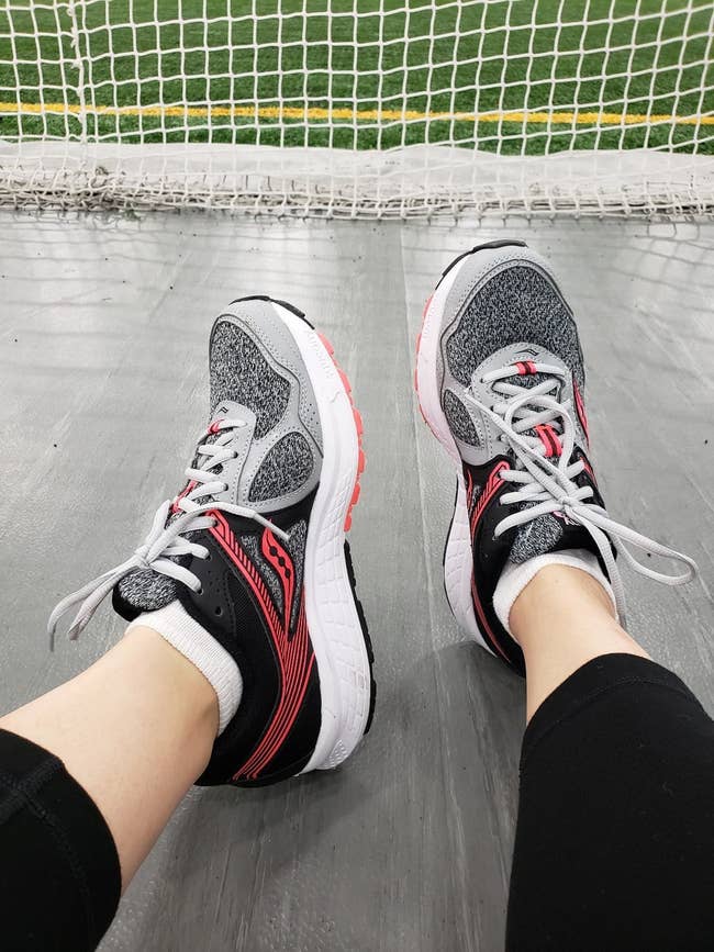 Reviewer wearing Saucony Cohesion 10s
