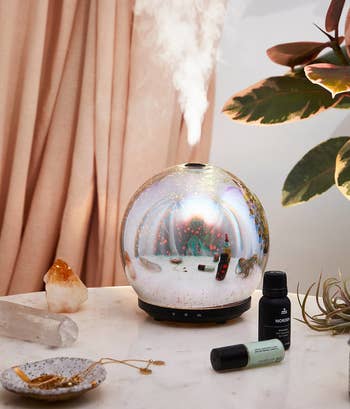 the crystal ball-style diffuser on a table 