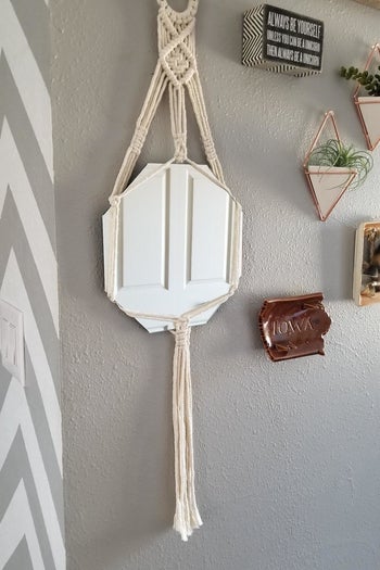 the mirror on a reviewer's wall 