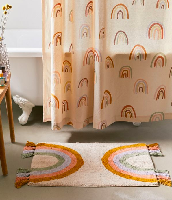 rainbow bath mat with tassels on either end