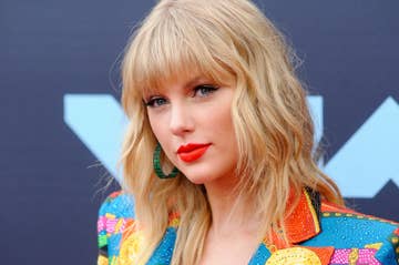 This Is How Taylor Swift Reacted To John Travolta Mistaking
