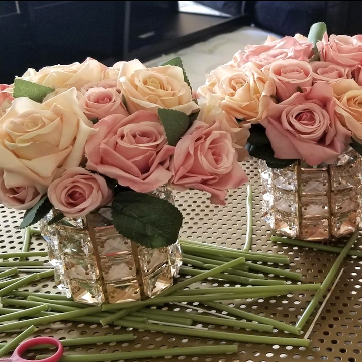 same holder holding roses