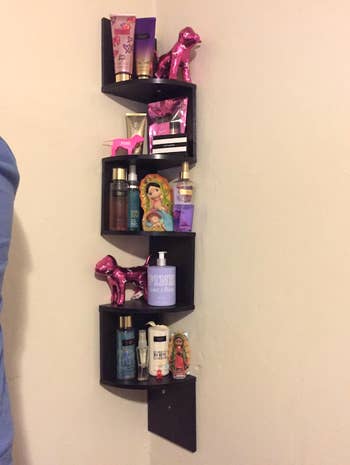 the black version of the shelf holding beauty products