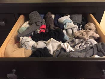 Reviewer's photo of their messy sock and underwear drawer