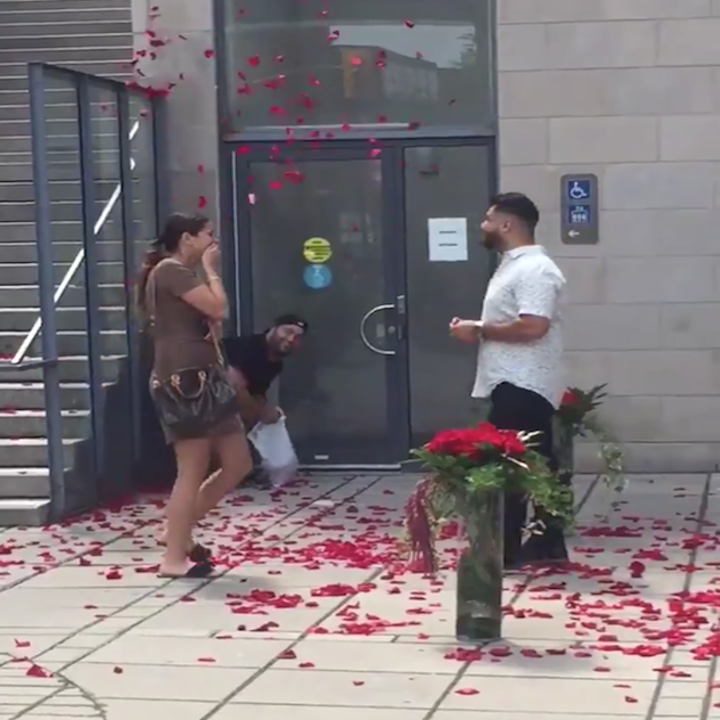 Guy Throws Rose Petals As Friends Get Engaged