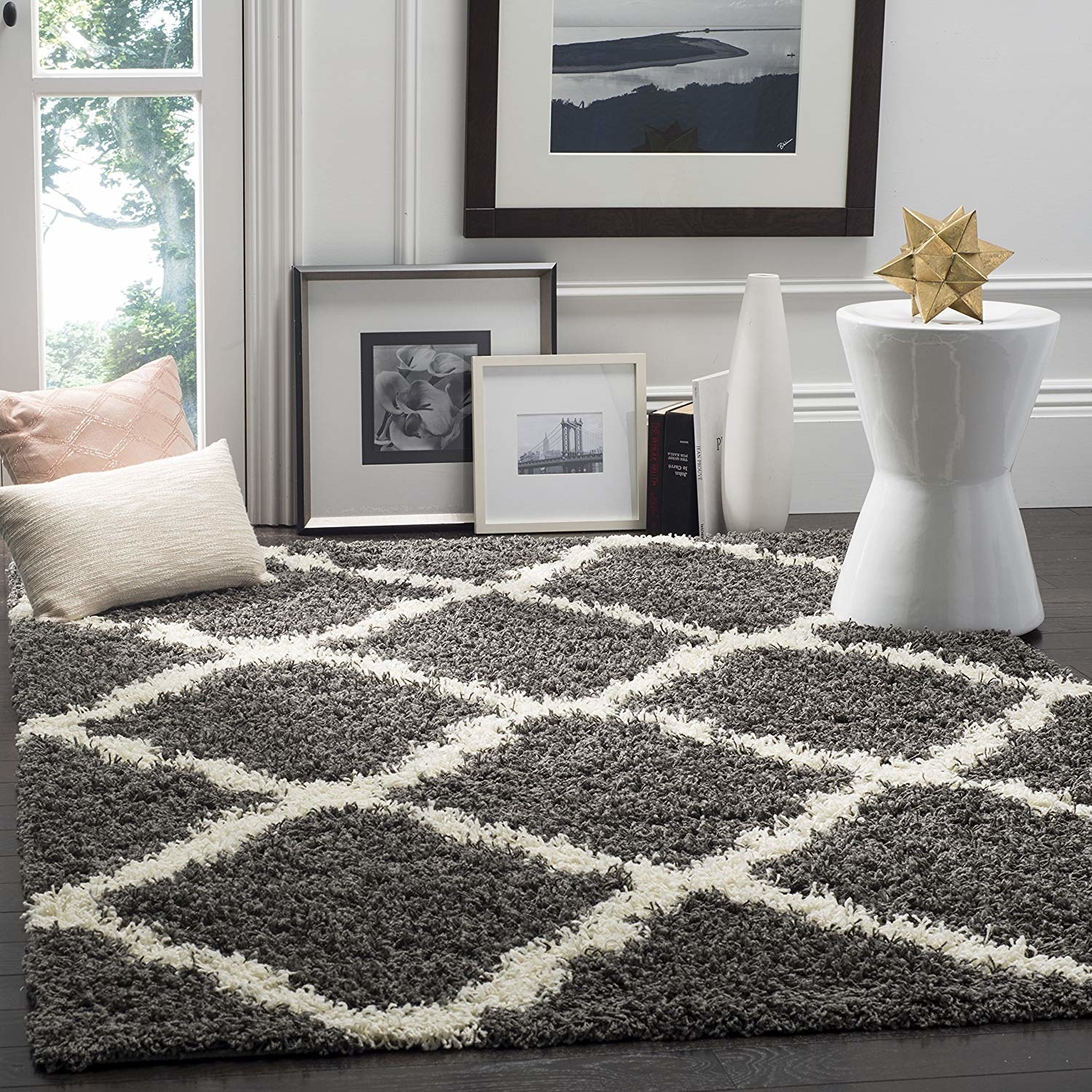 a gray rug with a white diamond pattern