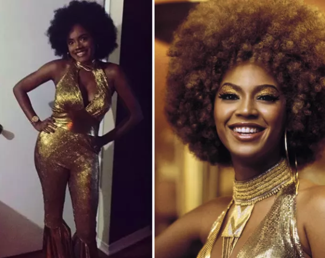 Someone dressed in Beyoncé&#x27;s gold outfit with an Afro