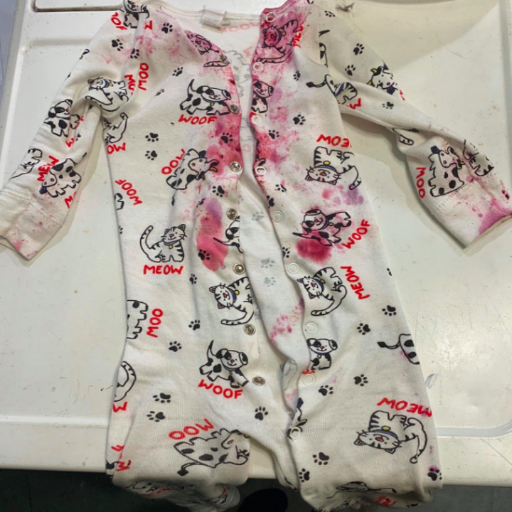 Stained clothes before using the remover