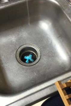 blue foam coming up from reviewer's garbage disposal