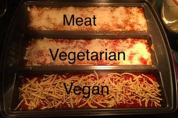 reviewer making three lasagnas labeled meat, vegetarian, and vegan in the pan