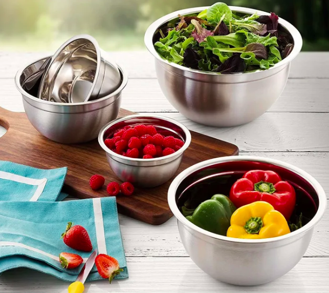 The four mixing bowls filled with fruits and veggies