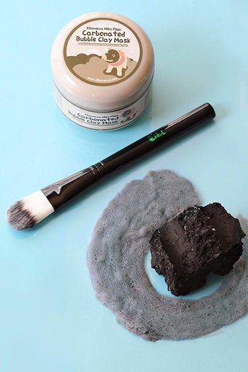 Product packaging with brush 