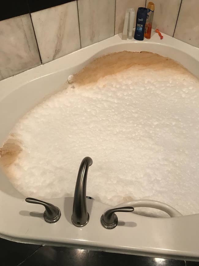 bubbly jet tub with brown goo coming from vents 