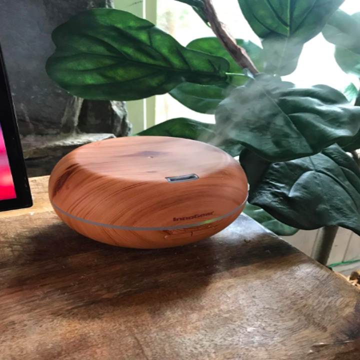 Wooden diffuser front view in action
