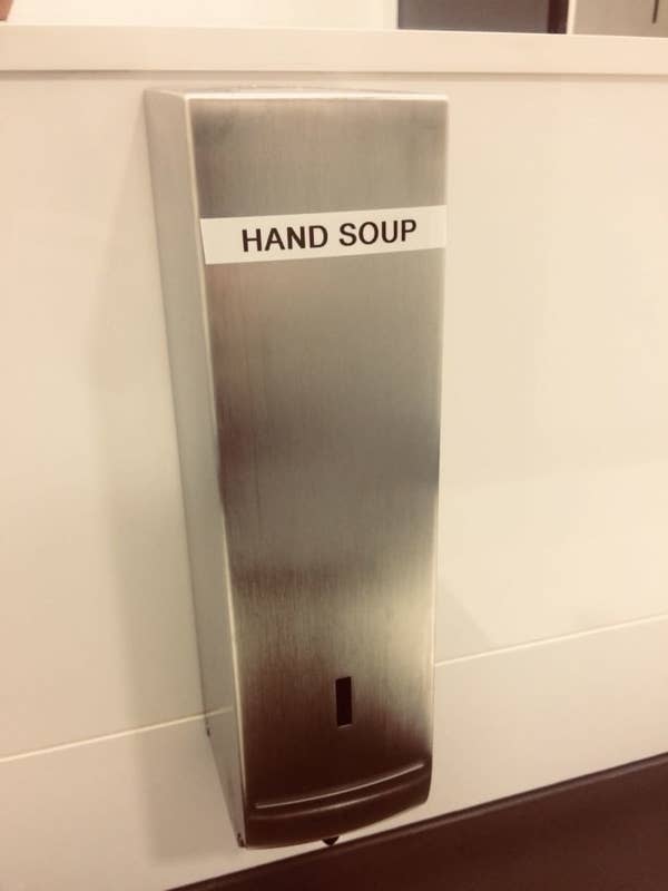 Soap dispenser labeled "hand soup"