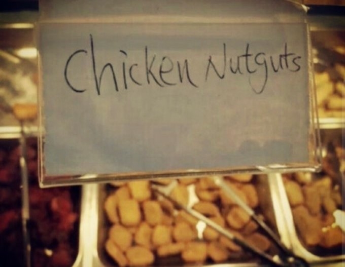Chicken nuggets container labeled &quot;chicken nutguts&quot;