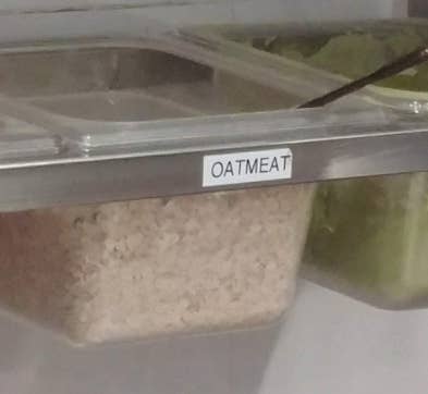 Oatmeal container labeled "oatmeat"