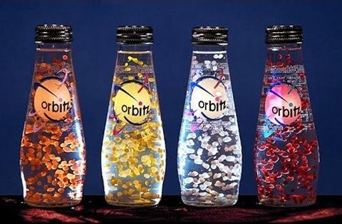 A photo of four bottles of Orbitz drinks.