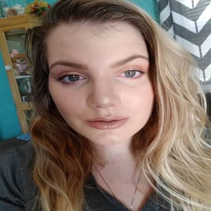 reviewer photo wearing primer with makeup looking in place