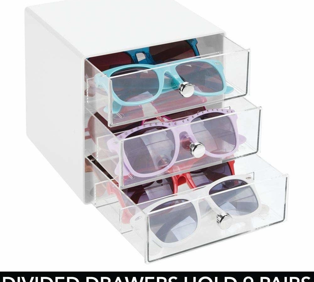organizer with clear drawers containing glasses