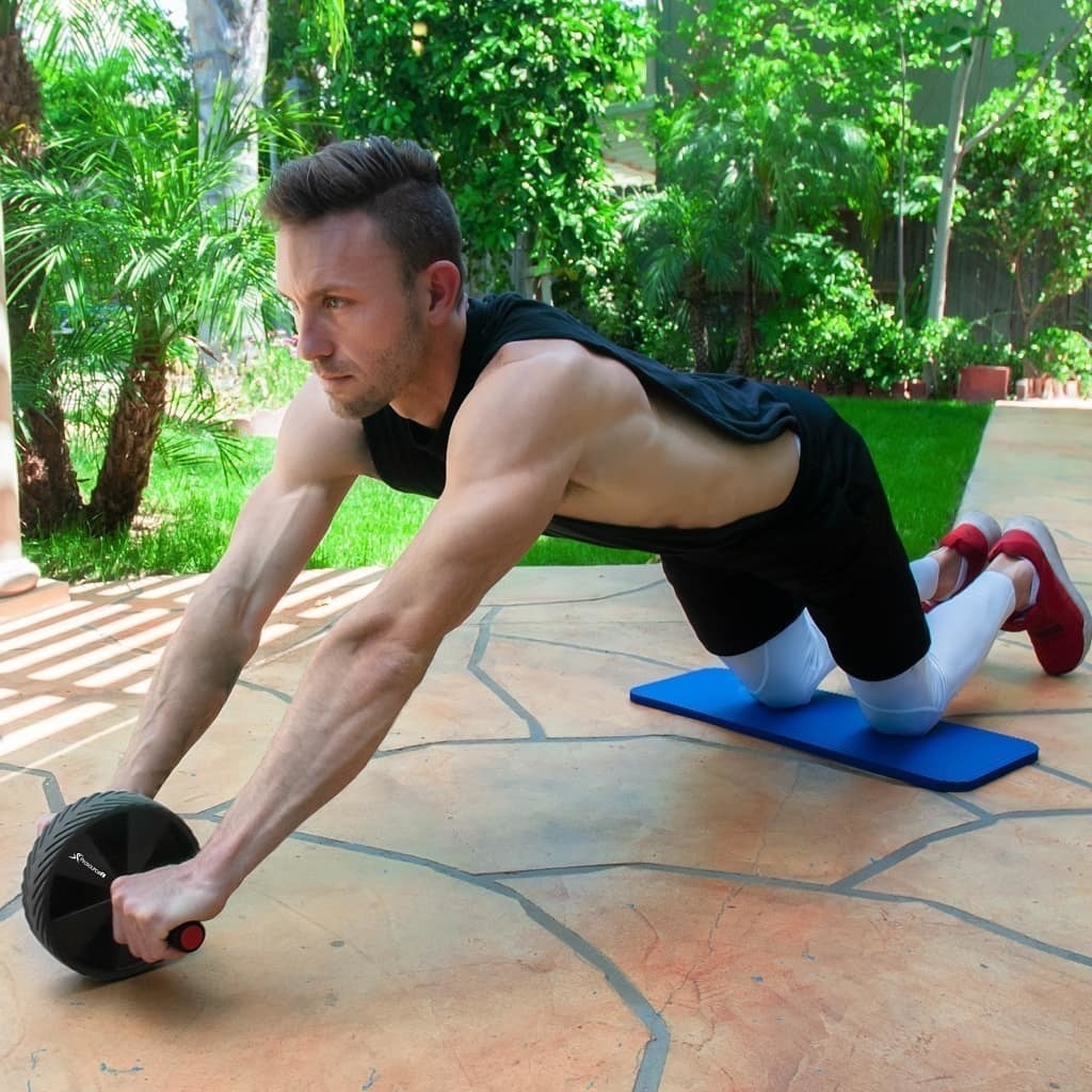 Person exercising while using the knee pad