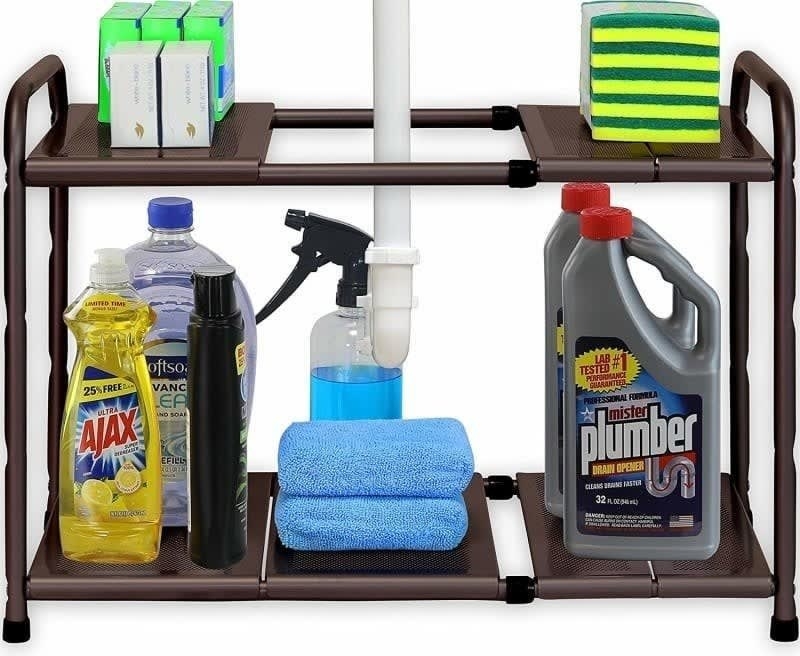 The rack in brown holding various cleaning products