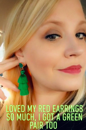 A reviewer wearing the long green earrings with a druzy detail post with a three-tier tassel. Caption reads 