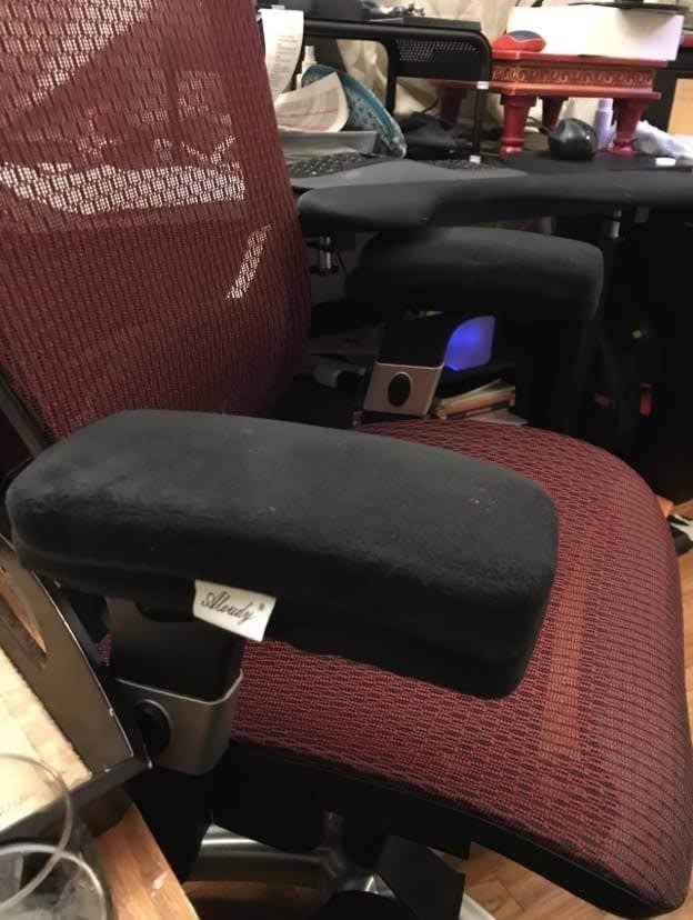 Reviewer picture of the armrest pads on a desk chair