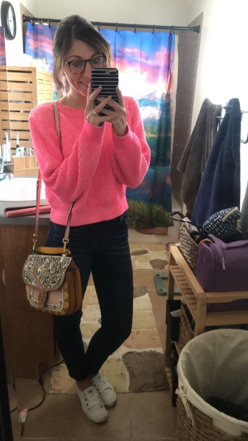 Reviewer in the hot pink cropped sweater