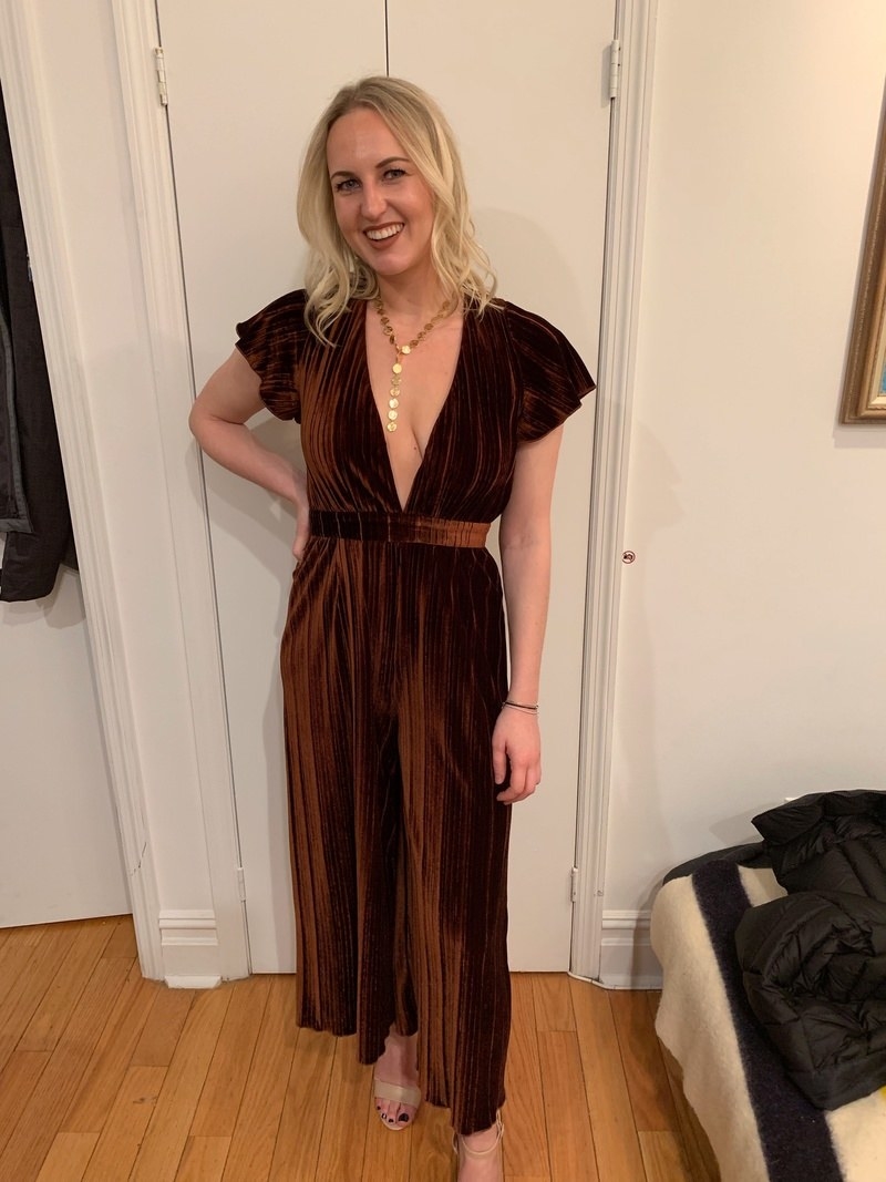 Reviewer in the pleated plunge jumpsuit in brown velvet