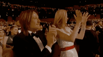 Another view of Nicole clapping slowly by just touching her palms lightly together and her fingers facing away from each other