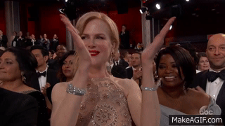 David Oyelowo clapping normally and Nicole clapping by not even touching her hands together and holding one awkwardly at an angle