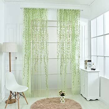 Sheer curtains with vine design