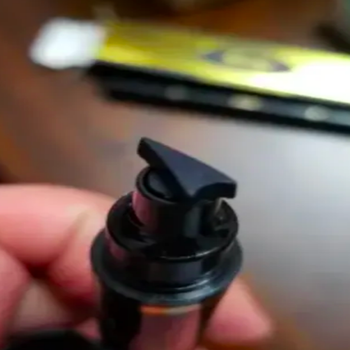 Reviewer holding up arrow-shaped stamp