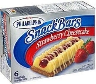 A product shot of a box of Strawberry Cheesecake Philadelphia Cheesecake Snack Bars