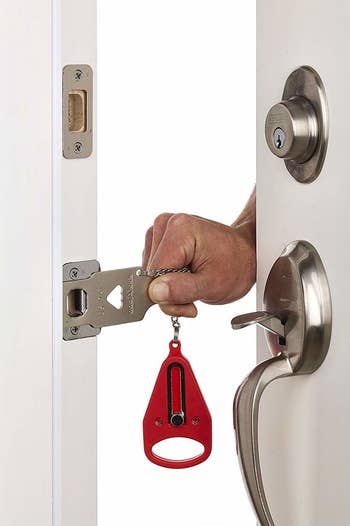 door open showing how the mechanism works to hold the door latch in place