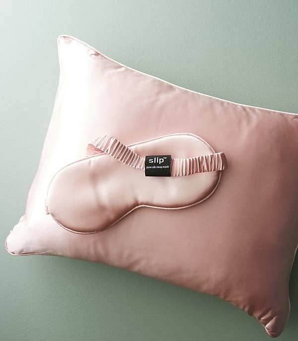 the silk eye mask and pillow in pink