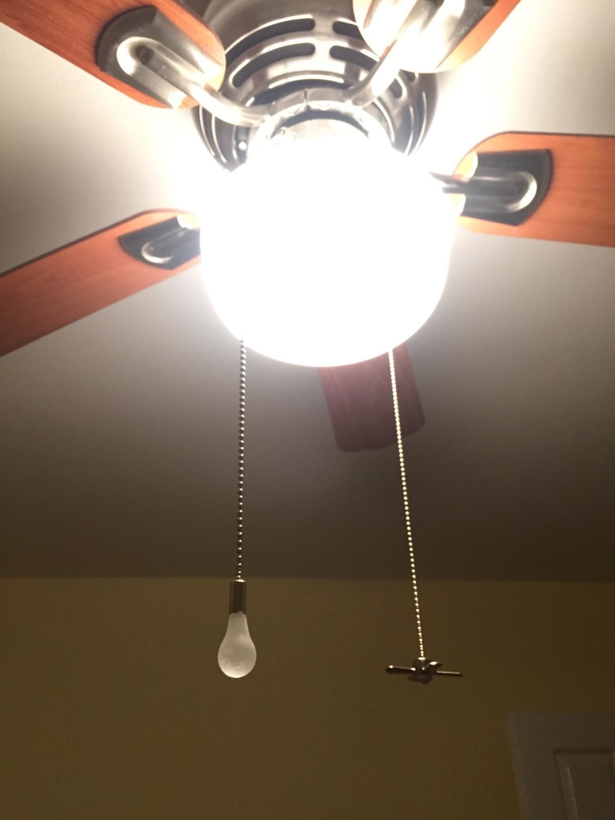 charms shaped like a lightbulb and fan 