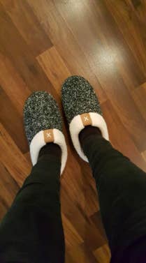 reviewer pic  wearing the gray slippers