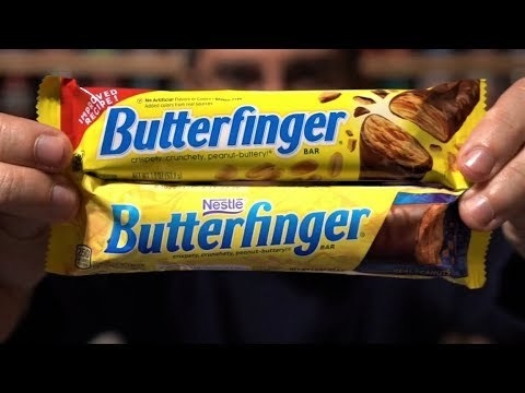 Two Butterfinger bars next to each other, one in the old packaging, and one in the new
