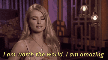 gif of Demi from &quot;the bachelor&quot; saying &quot; I am worth the world, I am amazing&quot;