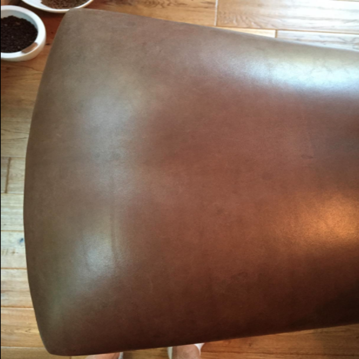 And after: the same stool, with no more water stains, and looking cleaner and a lighter brown