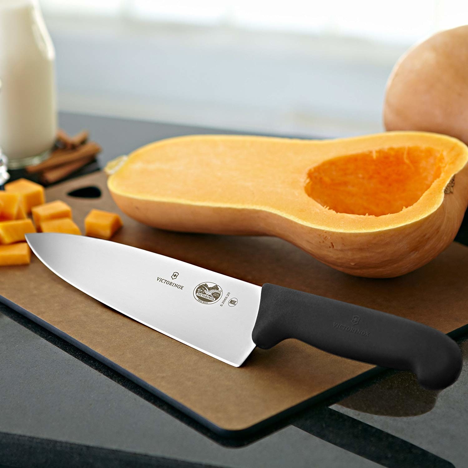 The knife next to a squash