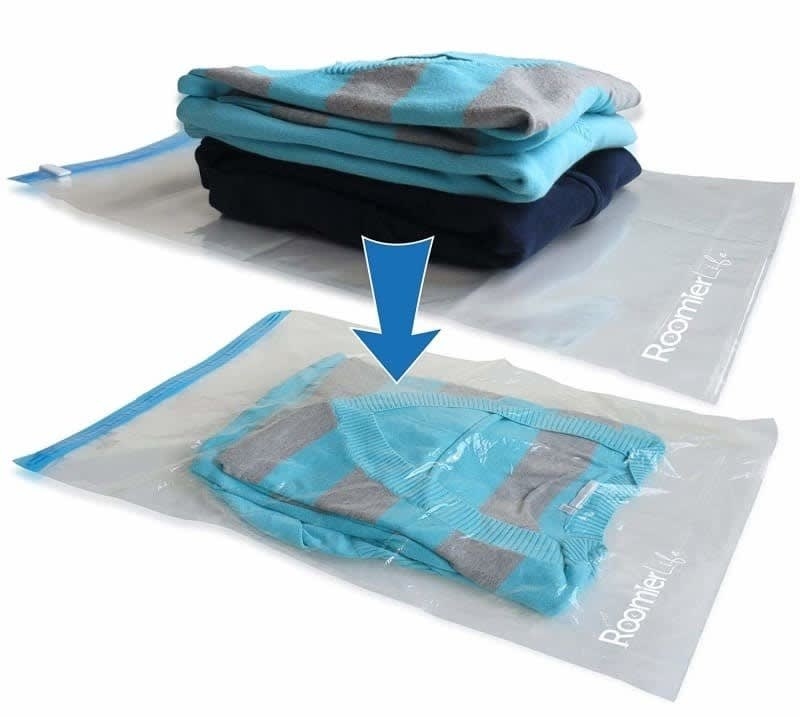 one space saver bag with clothes on top and then another with the clothes inside, showing how much smaller it makes the clothes
