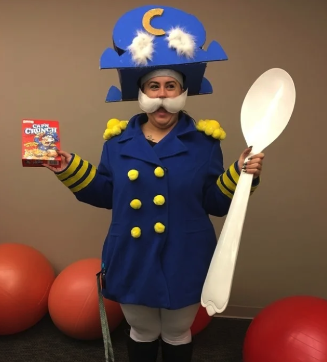 Someone dressed as Cap&#x27;N crunch while holding a giant spoon