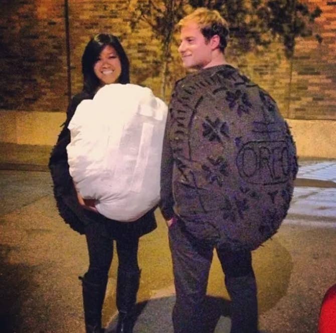 Two people dressed in matching Oreo cookie costumes